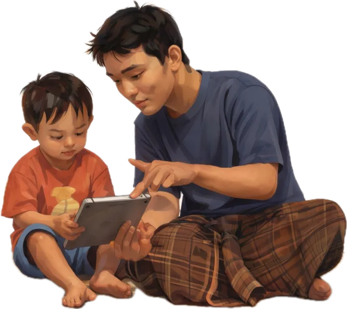 Ayah duduk di tikar di samping si Kecil, menunjuk tablet sambil mengangkat dua jari